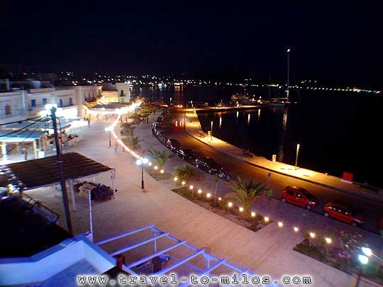 The port of Adamas at night  